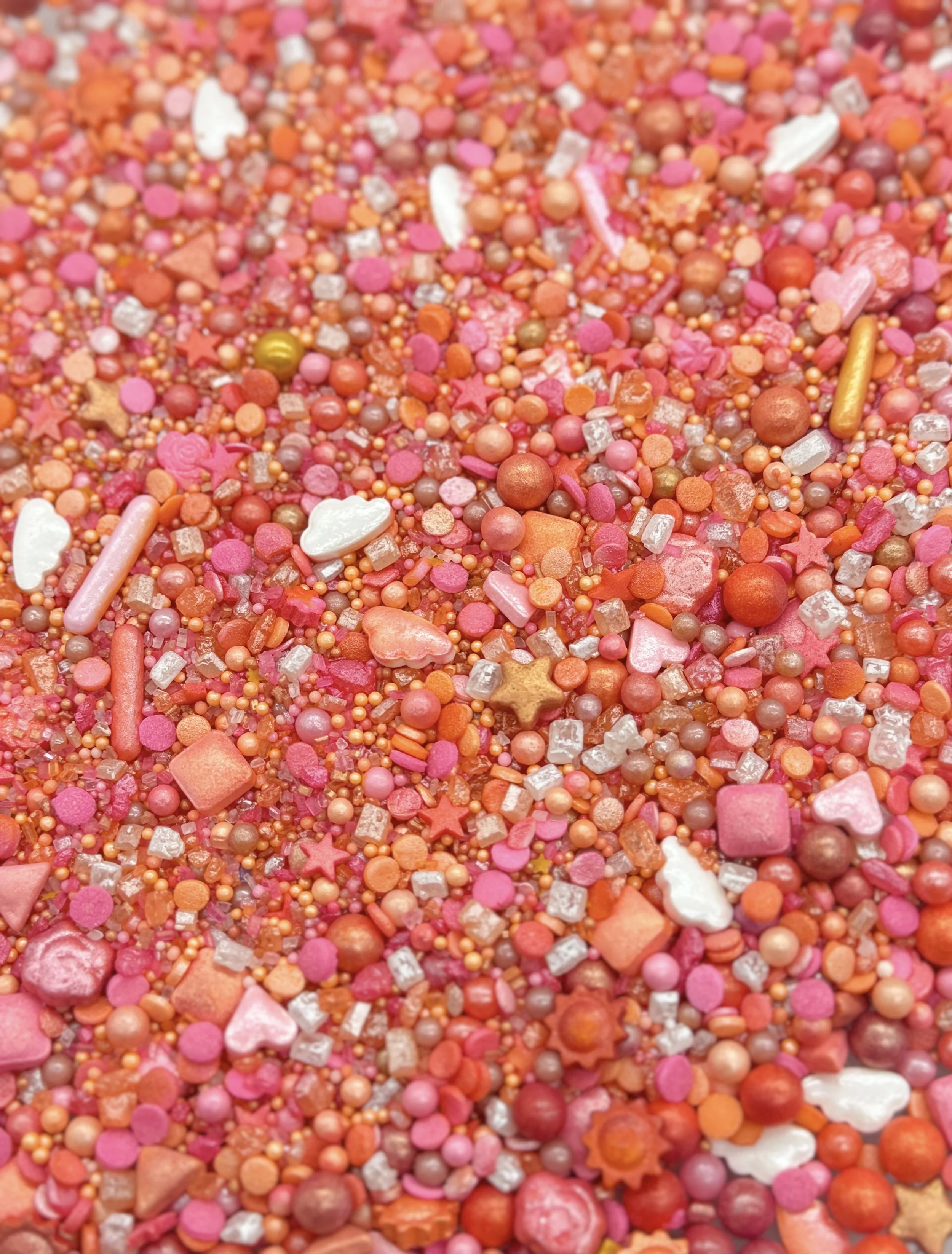Shop our Luxury Sprinkle Mix in Sweet Sunset with shades of orange